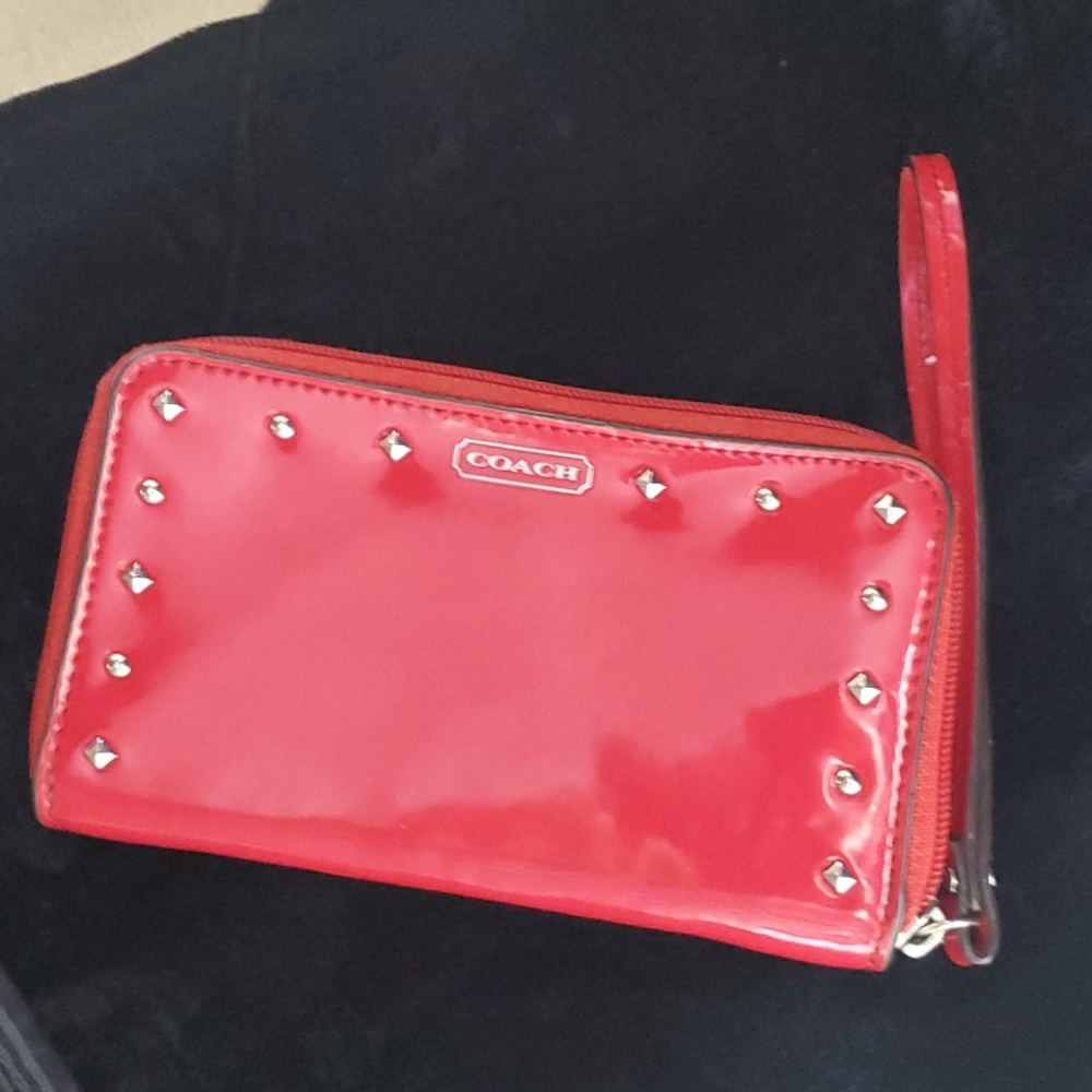 Coach wristlet, shiny and red.
